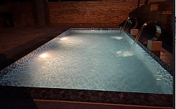 KOLAM H: TAMBAK TANAH BAGI KAWASAN BERBUKIT DENGAN BINAAN TEMBOK KELILING